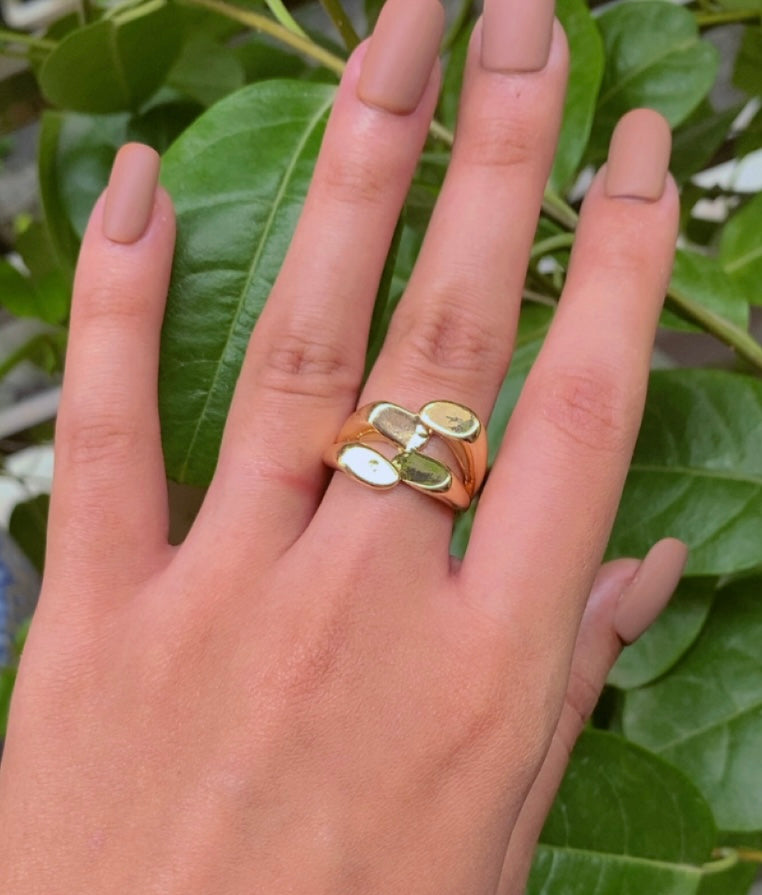 statement purple necklace and earring with a gold color ring